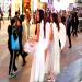 Girls dressed like a angel are advertising for a luxury brand in central Hong Kong island